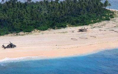 SOS Written in Sand Rescues Men Stranded on Island