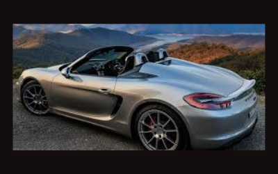 Cargo Ship carrying Porsches and Bentleys is Burning and Adrift at sea, Tow Boats on the way