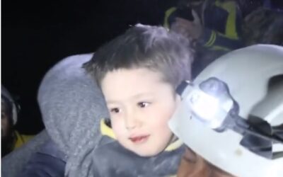 Boy Buried By Earthquake Plays With Rescue Team