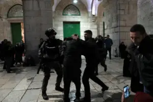 Israeli soldiers attacking Palestinian worshippers